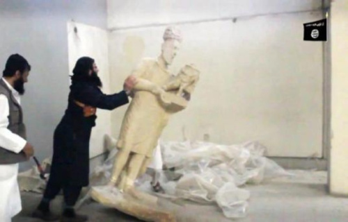 648x415_capture-ecran-video-diffusee-groupe-etat-islamique-montrant-jihadistes-detruisant-statues-musee-mossoul